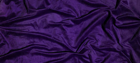 Beautiful smooth elegant wavy purple satin silk luxury cloth fabric texture, abstract background design pattern, top view