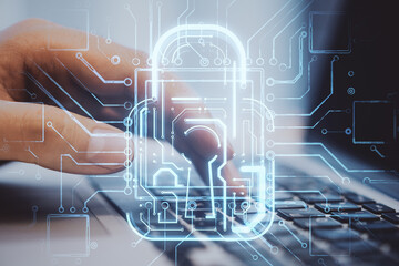 Aufkleber - Close up of businessman hands using laptop computer with creative glowing padlock circuit security hologram on blurry background. Safety and web protection concept. Double exposure.