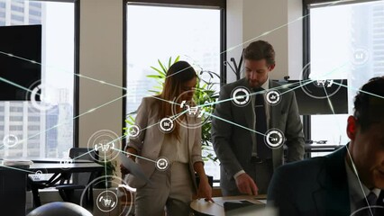 Poster - Computer icons connecting with lines over caucasian coworkers discussing in meeting room