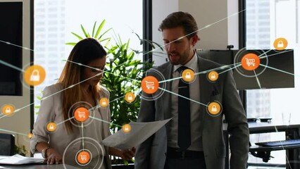 Poster - Computer icons connecting with lines over caucasian coworkers discussing papers in meeting room