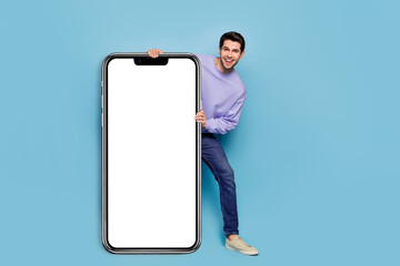 Aufkleber - Full body photo of cheerful funny guy demonstrate empty space blank offer isolated on blue color background