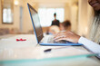 © Caia Image - Woman working from home at laptop