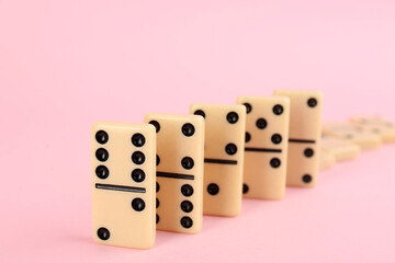 Sticker - White domino tiles falling on pink background