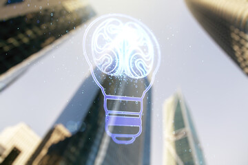 Poster - Abstract virtual idea concept with light bulb and human brain illustration on office buildings background. Neural networks and machine learning concept. Multiexposure