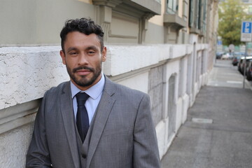 Handsome ethnic businessman wearing suit and tie 