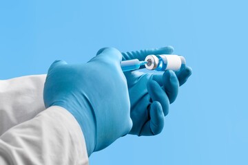 Canvas Print - Monkeypox vaccine in researcher hands. Holds syringe and bottle with vaccine for monkeypox cure. Concept of monkeypox treatment, injection, shot and clinical trial