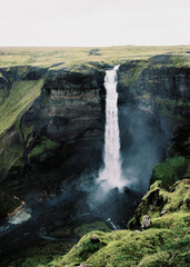 Wall Mural - Top view of Icelandic huge waterfall called Haifoss. Grainy film in the style of old photos