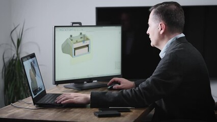 A senior engineer works for an industrial corporation designing parts for automobiles.