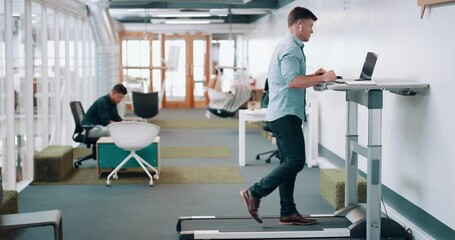 Aufkleber - Trendy corporate man multitasking work, listening to music while doing leg fitness for healthy life. Busy businessman exercising on a treadmill desk while working on laptop in modern office workplace