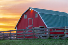 Red Barn In Prairie Sunset