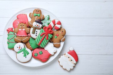 Wall Mural - Delicious Christmas cookies on white wooden table, flat lay. Space for text