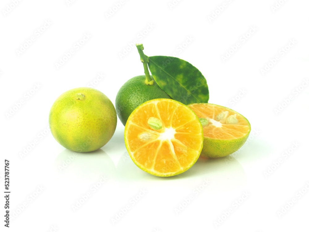 Fresh organic Calamansi lime on white background.
