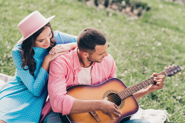 Canvas Print - Photo of shiny cute two people together wear casual outfits playing guitar sitting checkered blanket outside garden