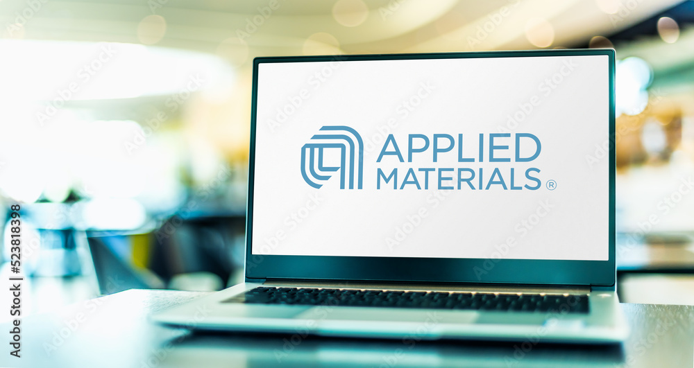 Laptop computer displaying logo of Applied Materials Stock Photo ...