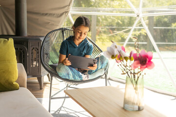 Wall Mural - child uses a Tablet PC