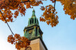 Autumn in Berlin, Germany. Yellow and orange leaves surround famous landmarks in European city such as St. Mary's church