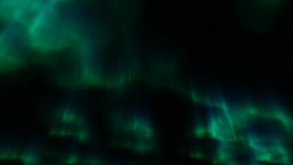 Wall Mural - beautiful green and red aurora dancing over the hills.