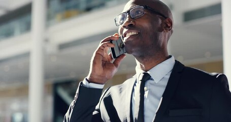 Wall Mural - Business man talking on the phone, answering a call and communication while happy, smiling and laughing from below. Corporate professional male hearing good news, feeling motivated and ambitious