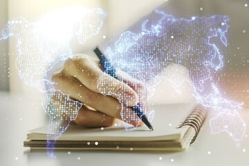 Poster - Double exposure of abstract digital world map and man hand writing in notepad on background, big data and blockchain concept