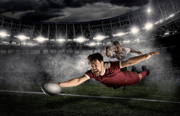 Wall Mural - Try.  Rugby football player in action