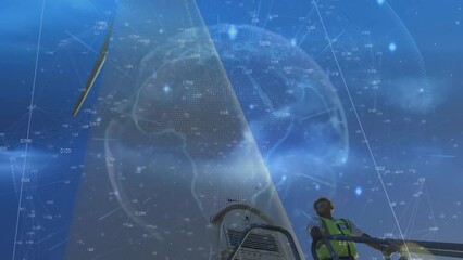 Poster - Animation of light trails over globe against male engineer using laptop standing on the windmill