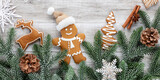 Fototapeta Kawa jest smaczna - Homemade christmas gingerbread cookies on wooden table.