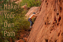 Make Your Own Path - Inspirational Motivational Poster With Copy Over Photograph Of Young Man Climbing Red Jagged Cliff With Climbing Harness