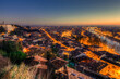 Aerial view of illuminated Verona city during sunset, Italy