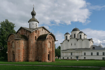 View of the Church of St. Paraskevi (Paraskevy Pyatnitsy na Torgu) and Nikolo-Dvorishchensky Cathedral in the background on the Yaroslavovo Dvorishche on a summer day, Veliky Novgorod, Russia