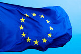 Fototapeta  - European Union Flag waving on blue background