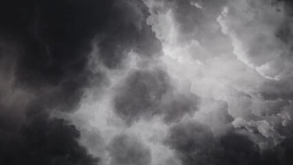 dark clouds and thunderstorms in the sky when the weather changes
