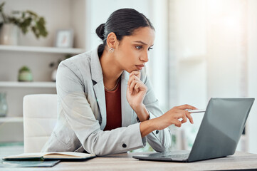 Aufkleber - Serious, laptop and professional businesswoman sitting and reading a work email with a pen working from home. Business, computer and focused female lawyer in modern office preparing for a case.