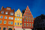 Fototapeta Londyn - old town hall building with a clock in the center on Wroclaw Square Poland
