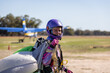© Austockphoto - Skydiver returning to base with parachute after a jump