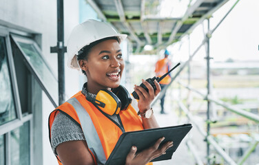 Poster - construction worker with tablet, walkie talkie or radio talking, instructing and checking building p
