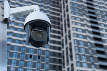 Poster - CCTV monitoring, security cameras. Backdrop with views of condominium
