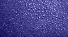 Very Peri Violet Color Water Drops, Abstract Background Or Texture Concept.. Water Drops On Glass
