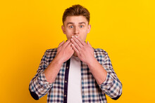 Photo Of Young Guy Worried Nervous Close Lips Hands Failure Shut Up Isolated Over Yellow Color Background