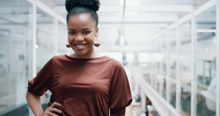 Canvas Print - Happy, confident young businesswoman with motivation and ambition in modern corporate office. A successful determined executive employee in formal startup company in position of strong leadership