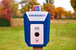 emergency box in city park - police call button for help from criminals. Park security, order in city