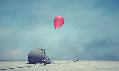 Fallen stone tied by a balloon . Trial and error. Motivation concept.