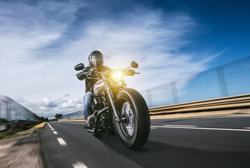 motorbike on the road riding. having fun driving the empty highway on a motorcycle tour journey