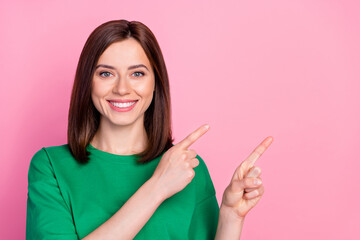 Wall Mural - closeup photo of young attractive cute girl finger pointing empty space recommend shop isolated on p