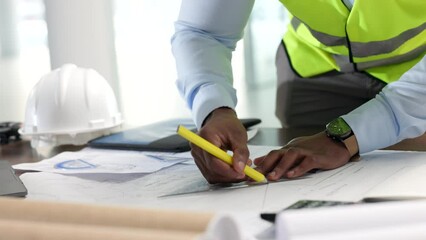 Poster - Hands of professional design, architect engineer drawing with graphic tools, construction plans blueprint. Closeup of an industrial designer working on illustration for new modern building project