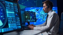 Workplace Of The Air Traffic Controllers In The Control Tower. Team Of Professional Aircraft Control Officers Works Using Radar, Computer Navigation And Digital Maps. Aviation Concept.