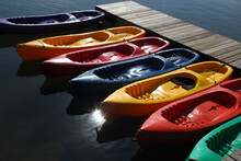 Colorful Kayaks On The Lake