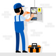© Agor2012 - Electrician makes the connection in the electrical panel. Electrician at work. Vector illustration.