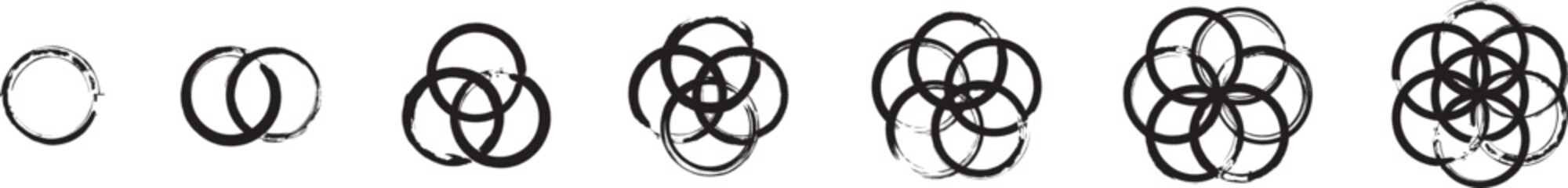 Set of the abstract symbols made with circles. Black ink handwriting.