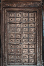 Ancient Wooden Carved Door Decoration. Antique Old Indian Door With The Brass Door Handle.