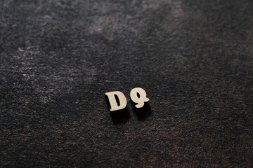 Wall Mural - The letters D and Q above the dark field. Initials DQ